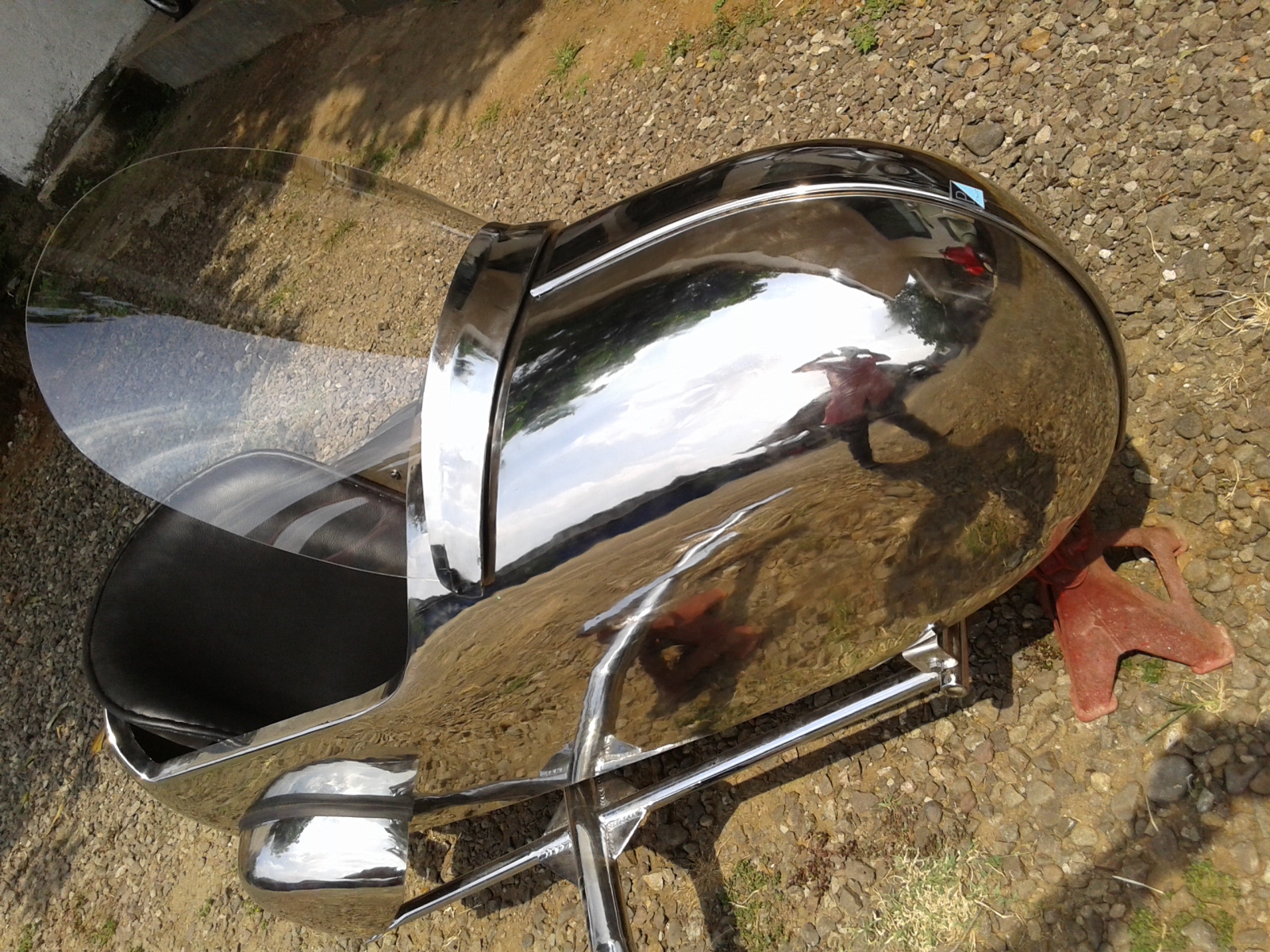 Close-up of stainless sidecar with windscreen